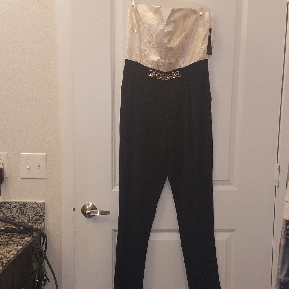 Strapless jumpsuit w gold embellish. 16